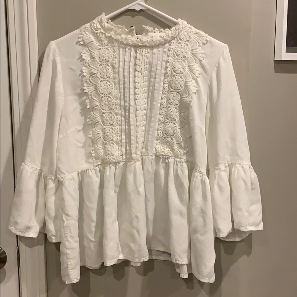 White peplum top with lace